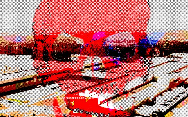 Colagem digital que tem como fundo um complexo de data centers com uma caveira em tons de vermelho desenhada por cima.