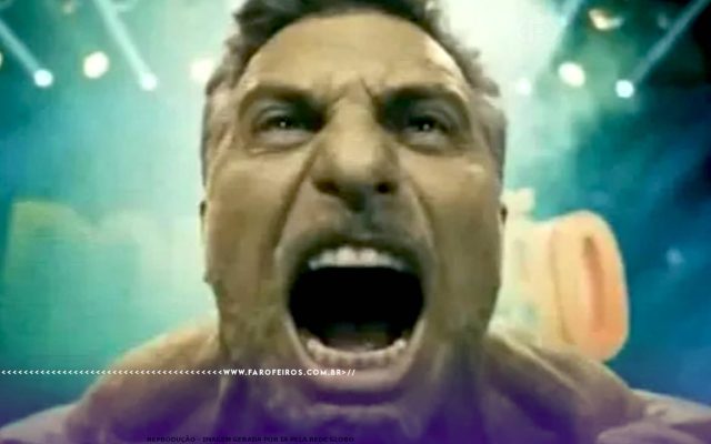 Corte de peça publicitária da Rede Globo mostrando Luciano Huck como o Incrível Hulk em close do rosto gritando